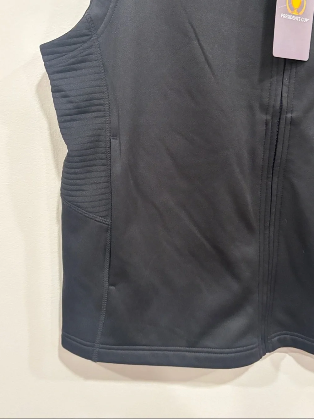 PGA TOUR Black Presidents Cup Sleeveless Zip Vest with Yellow Logo